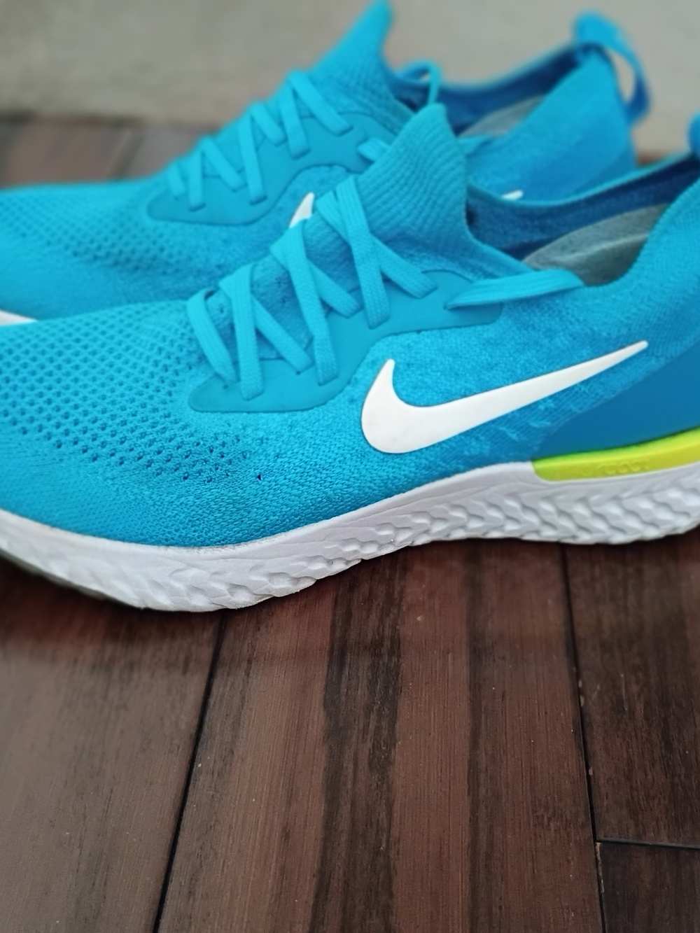 Nike Blue Knit Running Shoes with White Swoosh